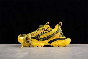 Balenciaga's 3XL Sneaker in yellow and black mesh and polyurethane